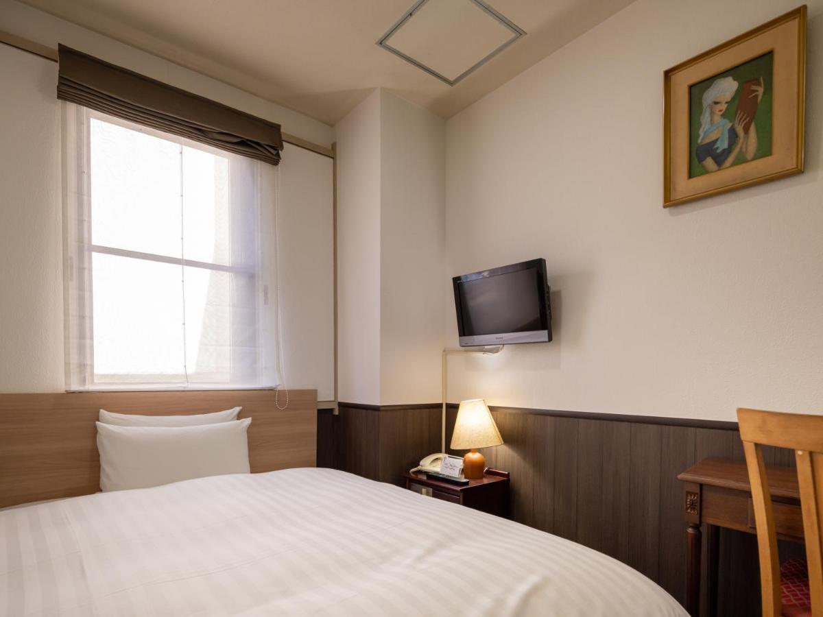 Hotel Flags Isahaya Nagasaki Bagian luar foto